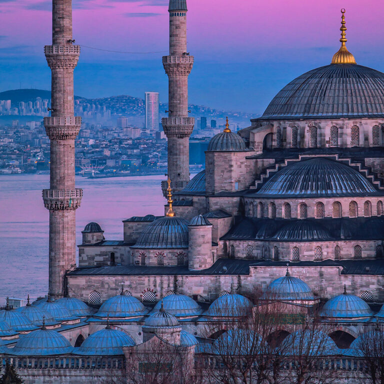 Turkey Palace and the background of the city with a lovely pink sunset